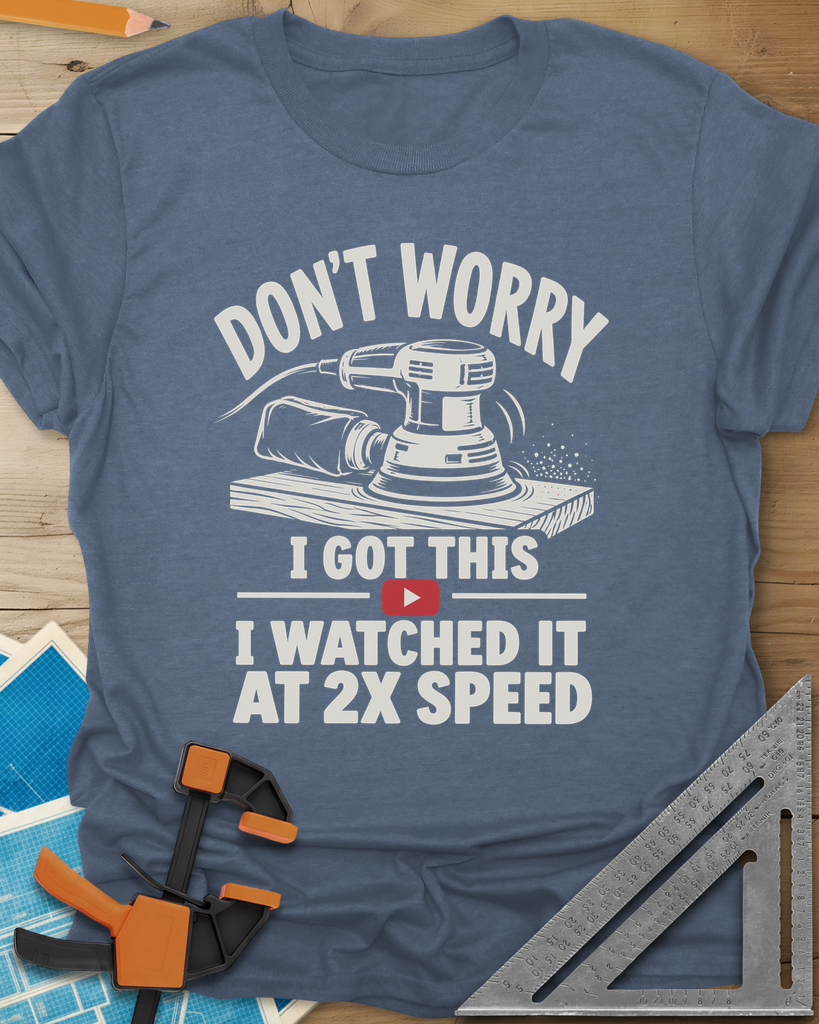 2x Speed t-shirt in Heather Indigo, an orbital sander on a board beside a red video play button