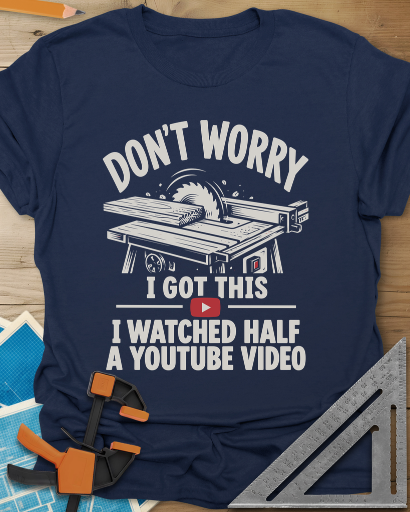 YouTube Video t-shirt in Navy, a table saw with a board at the blade above a red play button