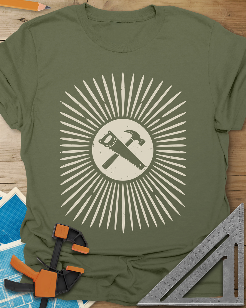 Saw & Hammer t-shirt in Military Green, crossed handsaw and hammer on a rust circle in a sunburst of rays