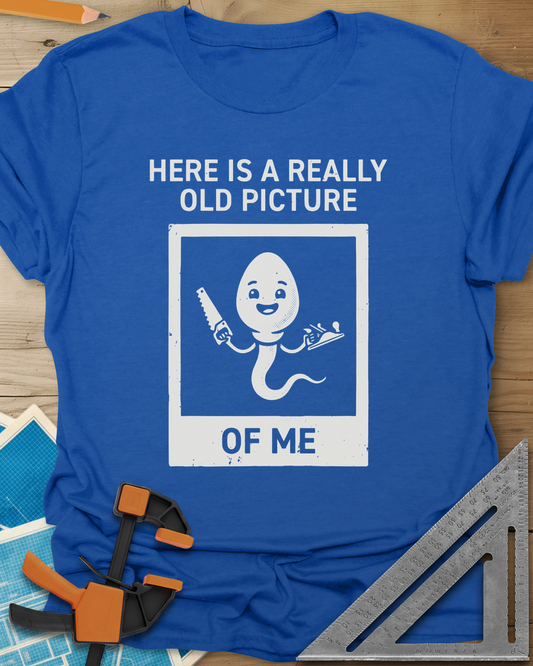 Old Picture t-shirt in Royal, a smiling cartoon figure with a long tail holding a saw and a plane