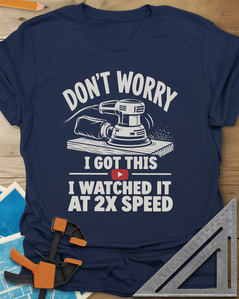 2x Speed t-shirt in Navy, an orbital sander on a board beside a red video play button