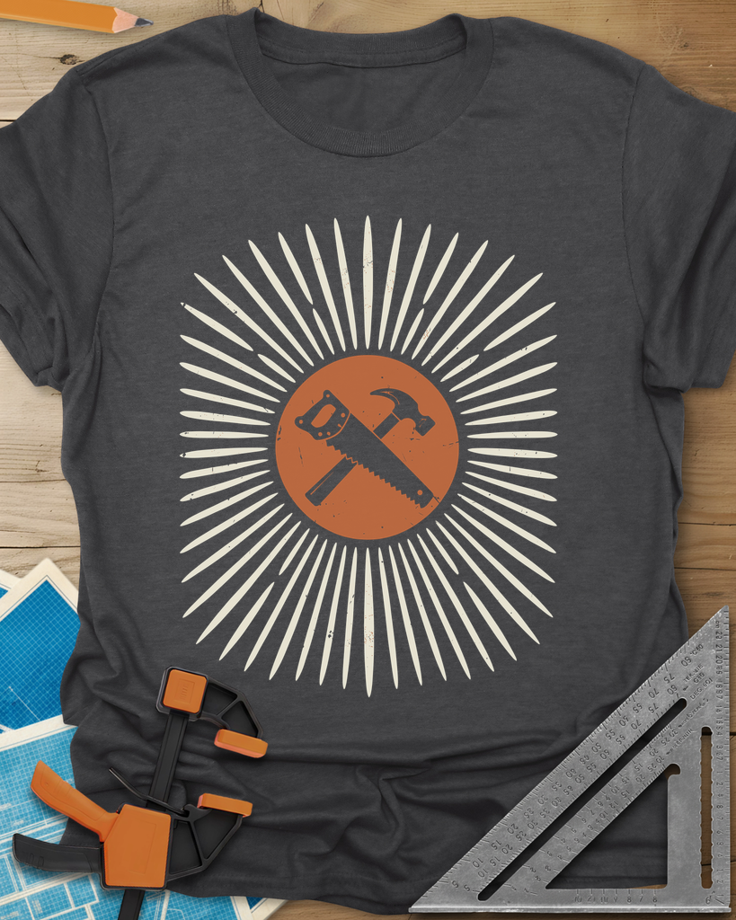 Saw & Hammer t-shirt in Dark Heather Grey, crossed handsaw and hammer on a rust circle in a sunburst of rays