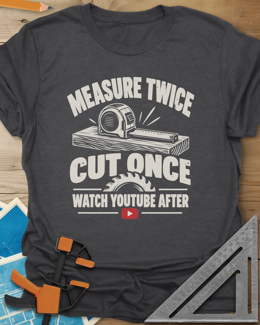 Watch YouTube After t-shirt in Dark Heather Grey, tape measure on a plank, a saw blade and a red play button