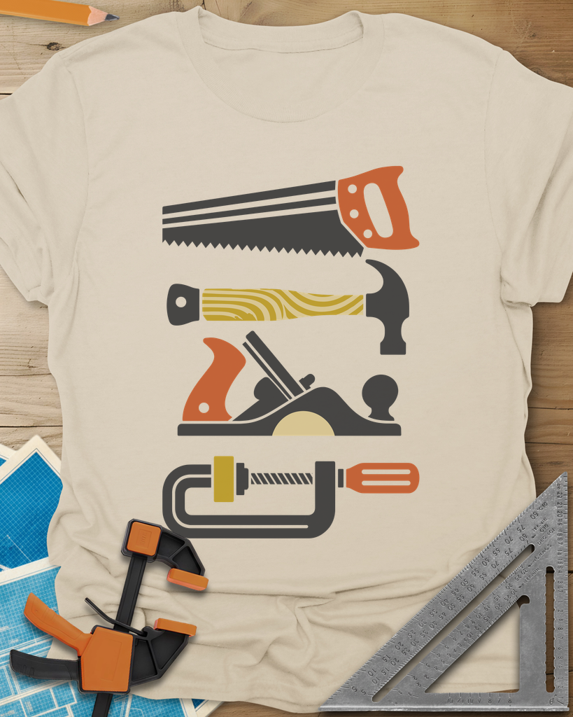 Tools Of The Trade t-shirt in Sand, stacked retro flat-color saw, hammer, hand plane and C-clamp