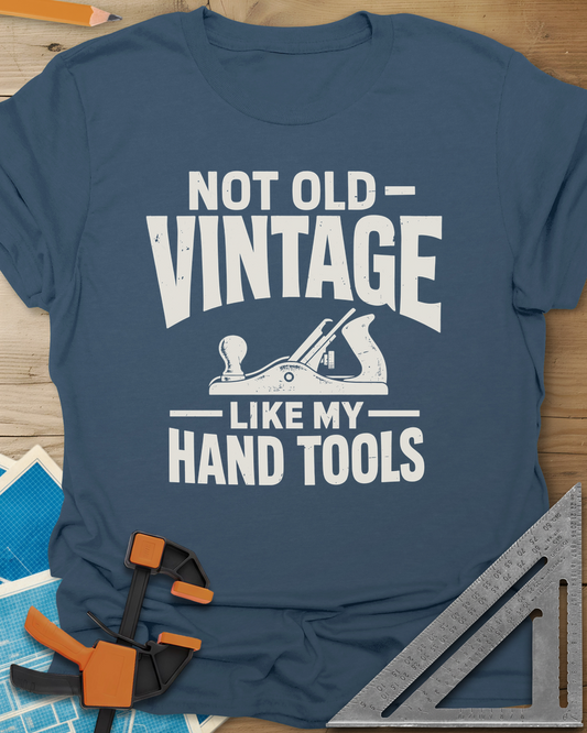 Vintage Tools t-shirt in Indigo Blue, a small bench plane between worn block lettering