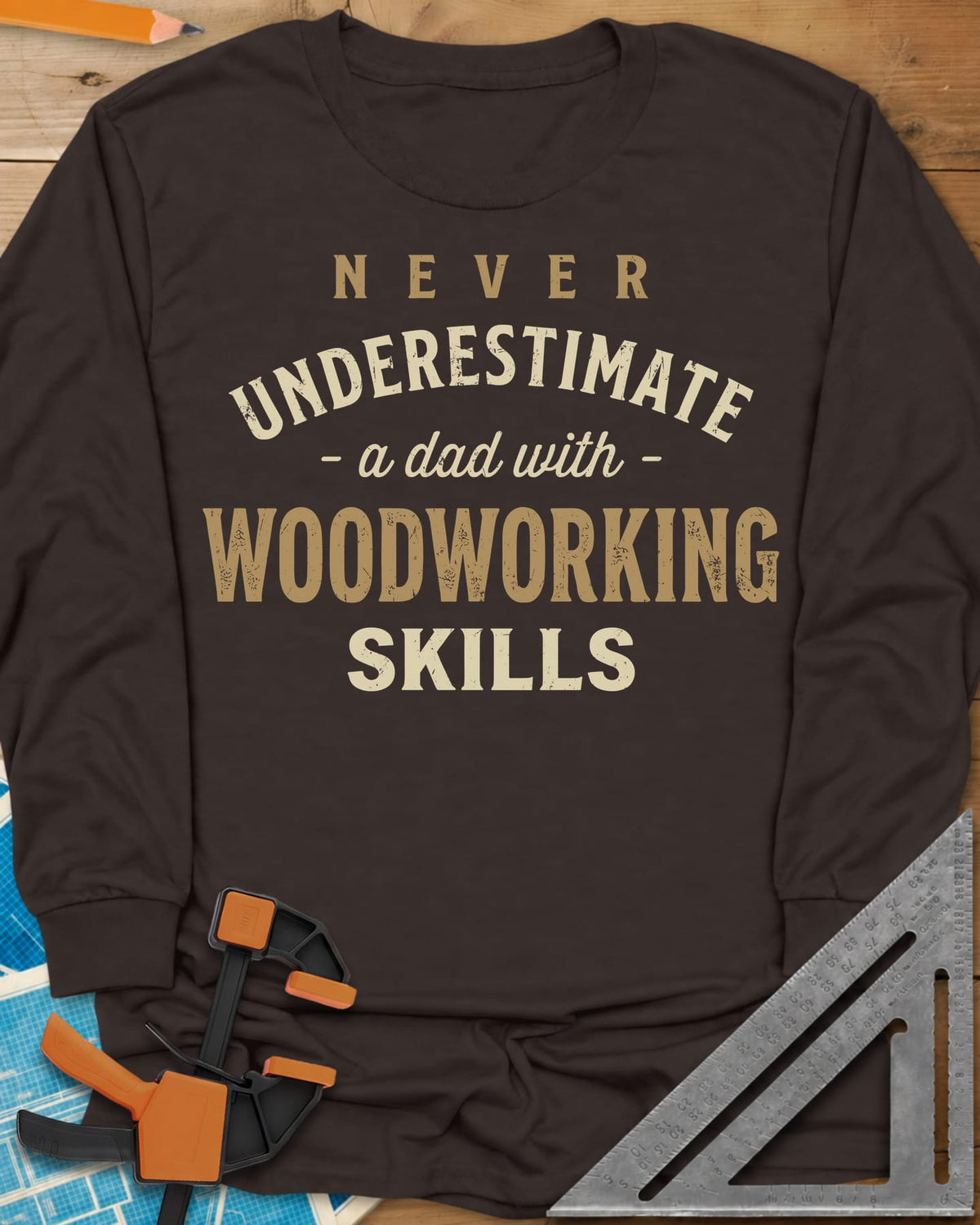 A Dad With Woodworking Skills long sleeve shirt in Dark Chocolate, arched worn lettering with WOODWORKING in the biggest