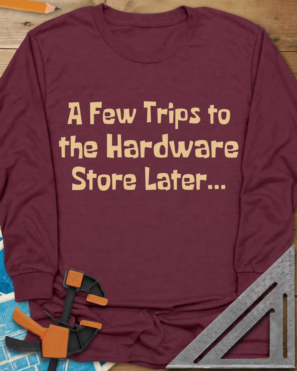 A Few Trips To The Hardware Store Later long sleeve shirt in Maroon, plain lettering in a chunky cartoon typeface