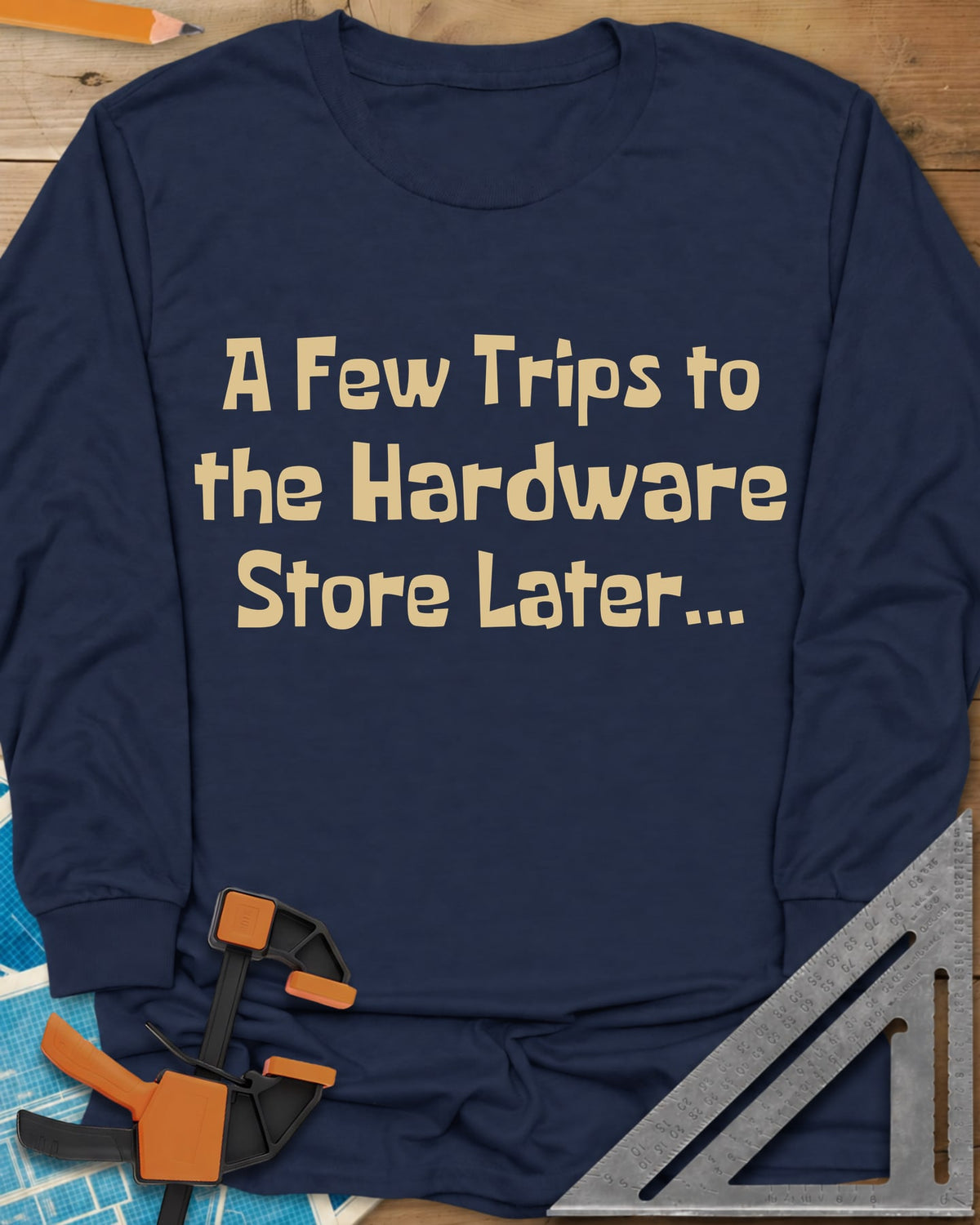 A Few Trips To The Hardware Store Later long sleeve shirt in Navy, plain lettering in a chunky cartoon typeface