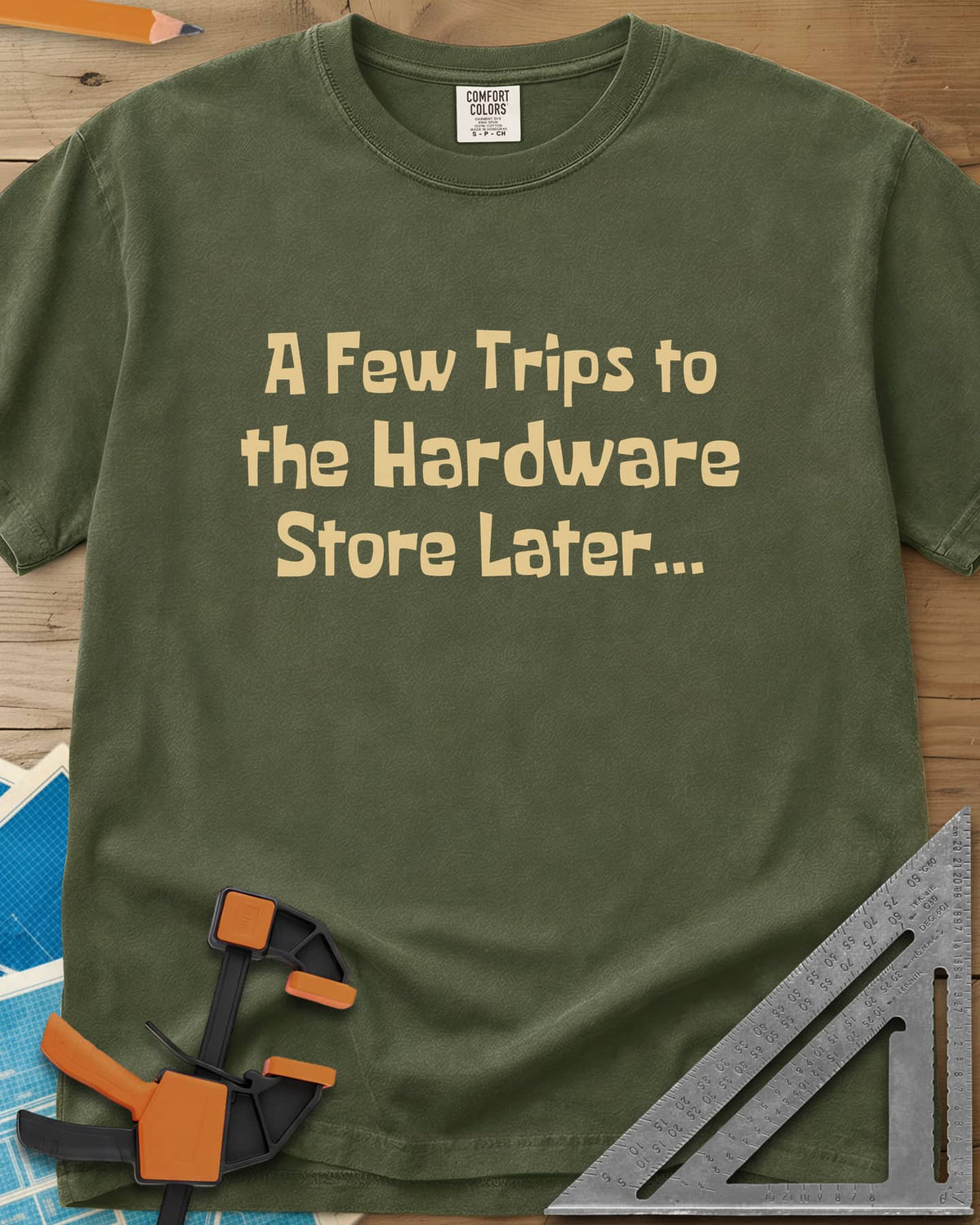 A Few Trips To The Hardware Store Later heavyweight tee in Hemp, plain lettering in a chunky cartoon typeface