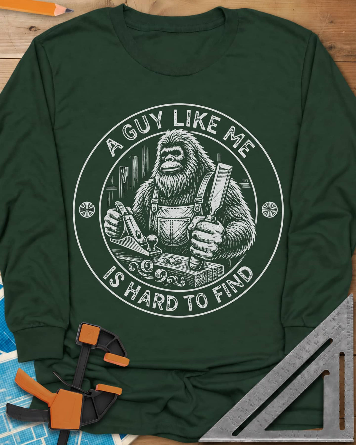 A Guy Like Me Is Hard To Find Woodworking long sleeve shirt in Forest Green, Bigfoot in overalls with a hand plane and