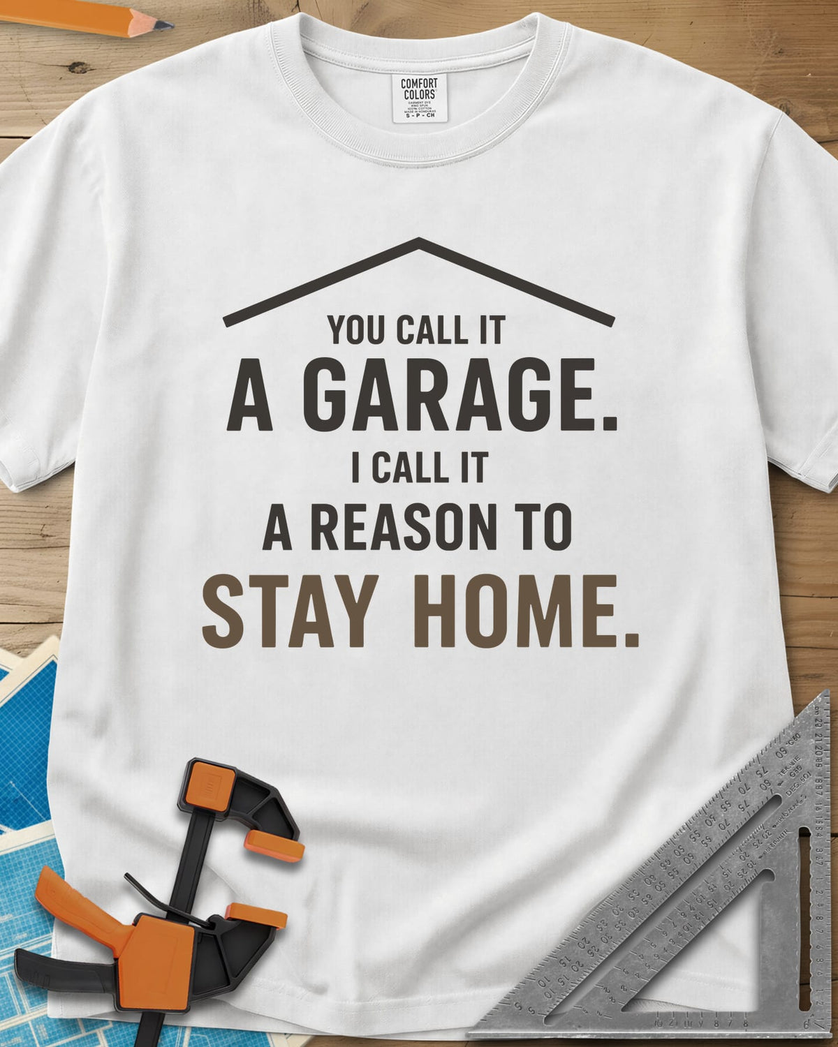 A Reason To Stay Home heavyweight tee in White, a simple roofline above bold two-tone lettering