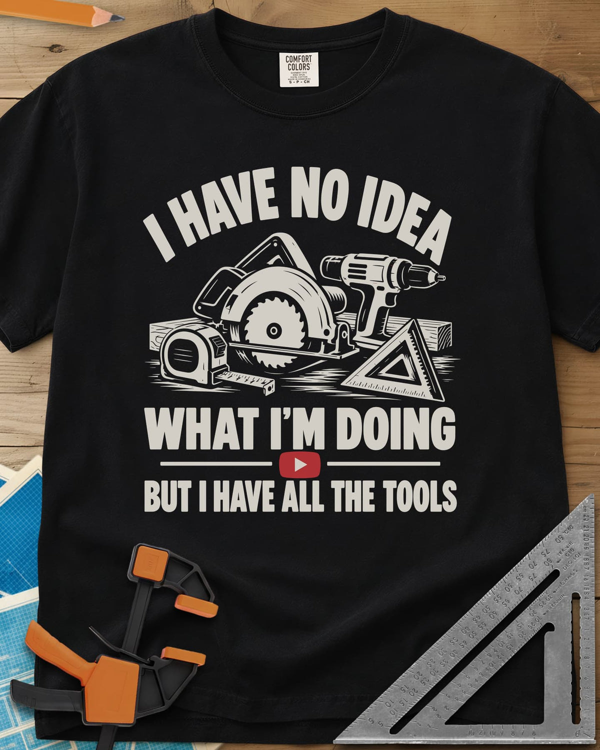 All The Tools heavyweight tee in Black, circular saw, drill, tape measure and square above a play button