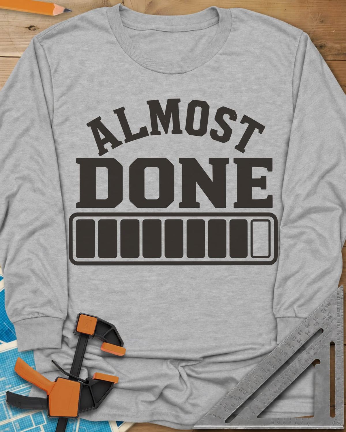 Almost Done long sleeve shirt in Sport Grey, bold ALMOST DONE lettering over a nearly full loading bar