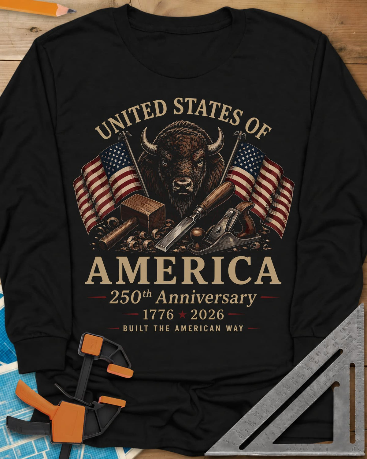America 250th Anniversary long sleeve shirt in Black, bison head between two flags over a mallet, chisel and hand plane