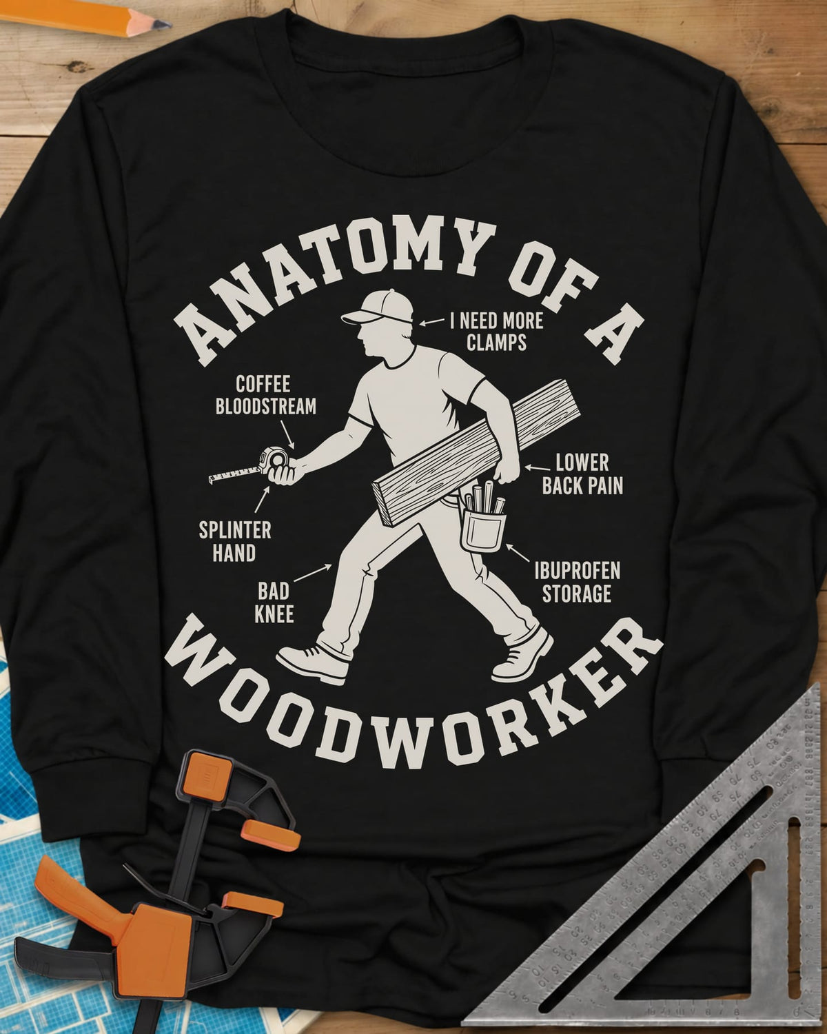 Anatomy Of A Woodworker long sleeve shirt in Black, a walking man with a board and a tape measure, body parts labeled