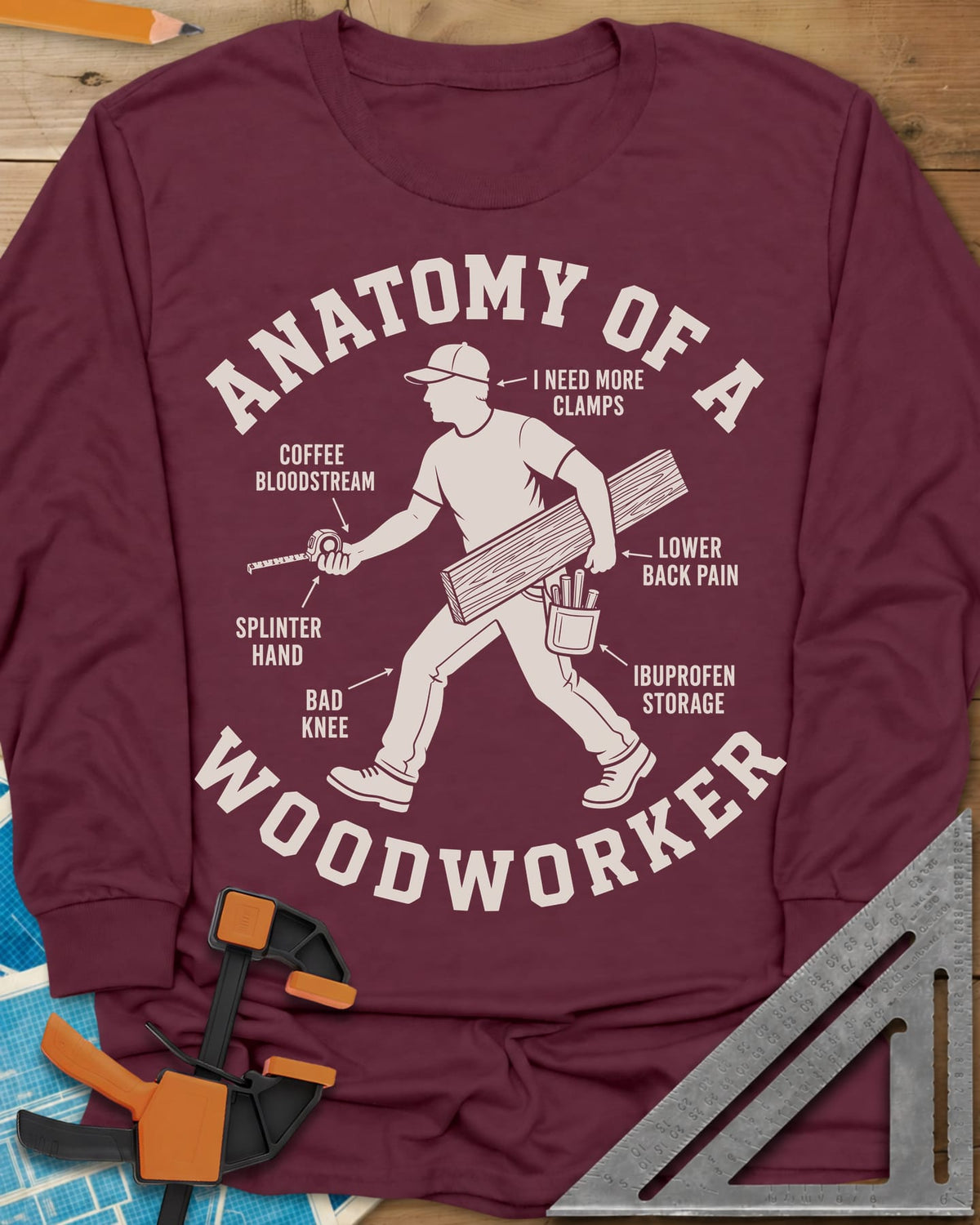 Anatomy Of A Woodworker long sleeve shirt in Maroon, a walking man with a board and a tape measure, body parts labeled