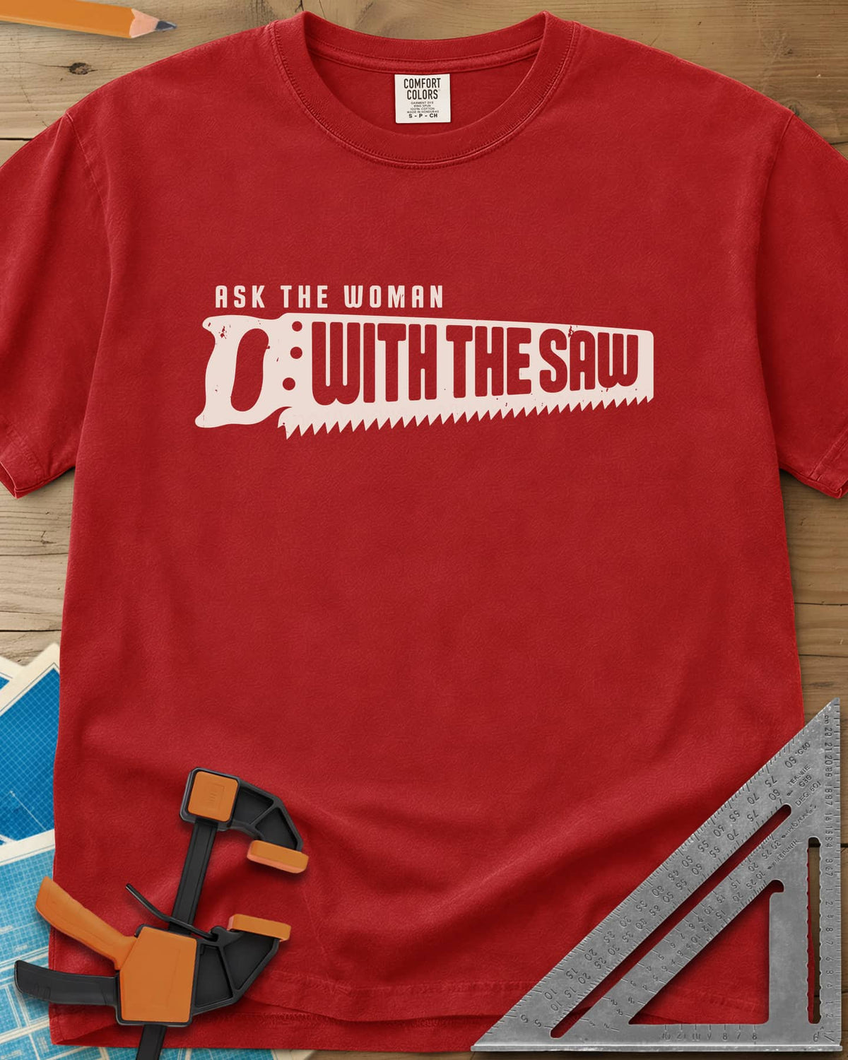 Ask The Saw heavyweight tee in Red, worn lettering inside a handsaw-shaped banner