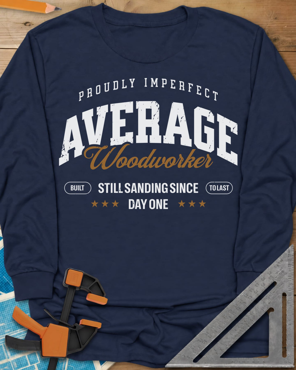 Average Woodworker long sleeve shirt in Navy, varsity AVERAGE over gold script Woodworker, with badges and stars