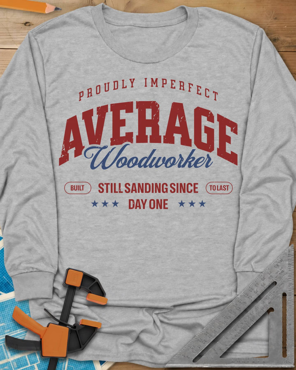 Average Woodworker long sleeve shirt in Sport Grey, varsity AVERAGE over gold script Woodworker, with badges and stars