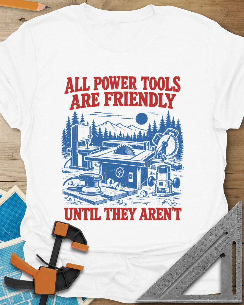 Friendly Tools t-shirt in White, a table saw, bandsaw, miter saw, sander and router in a forest