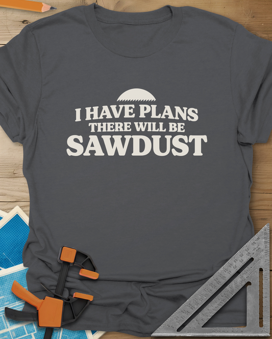 There Will Be Sawdust t-shirt in Charcoal, half a toothed saw blade above rounded, bold lettering