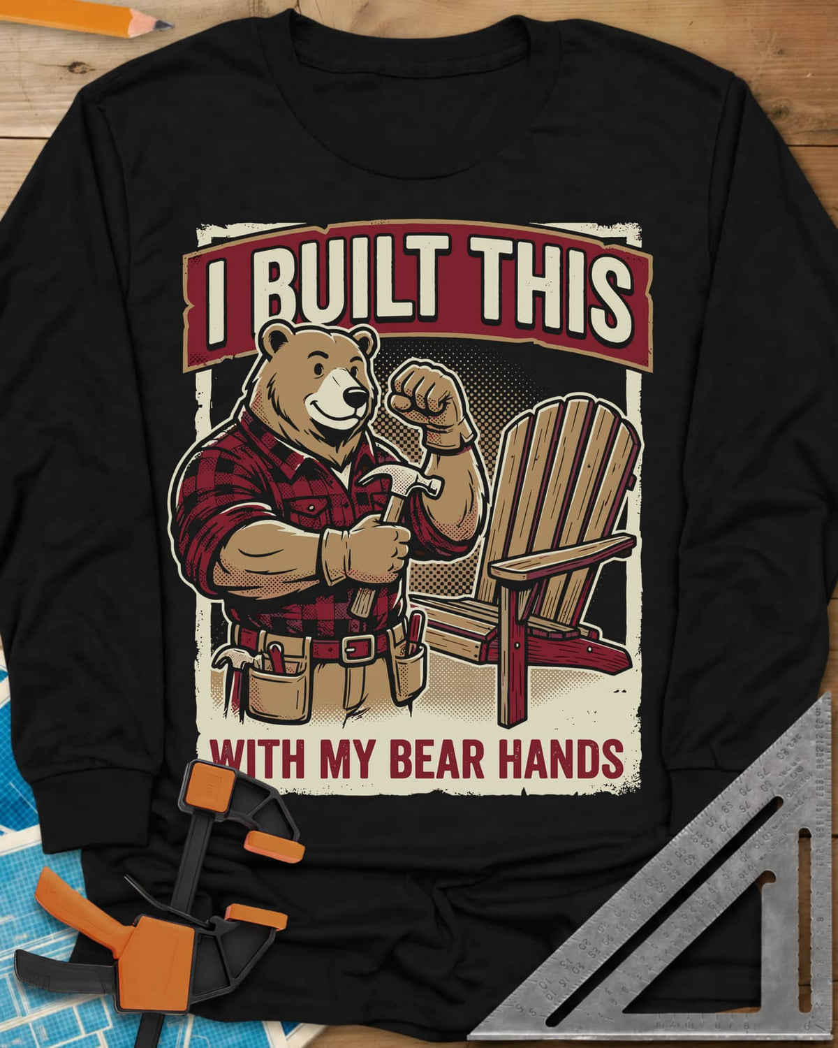 Bear Hands long sleeve shirt in Black, a flannel bear with hammer and tool belt beside an Adirondack chair
