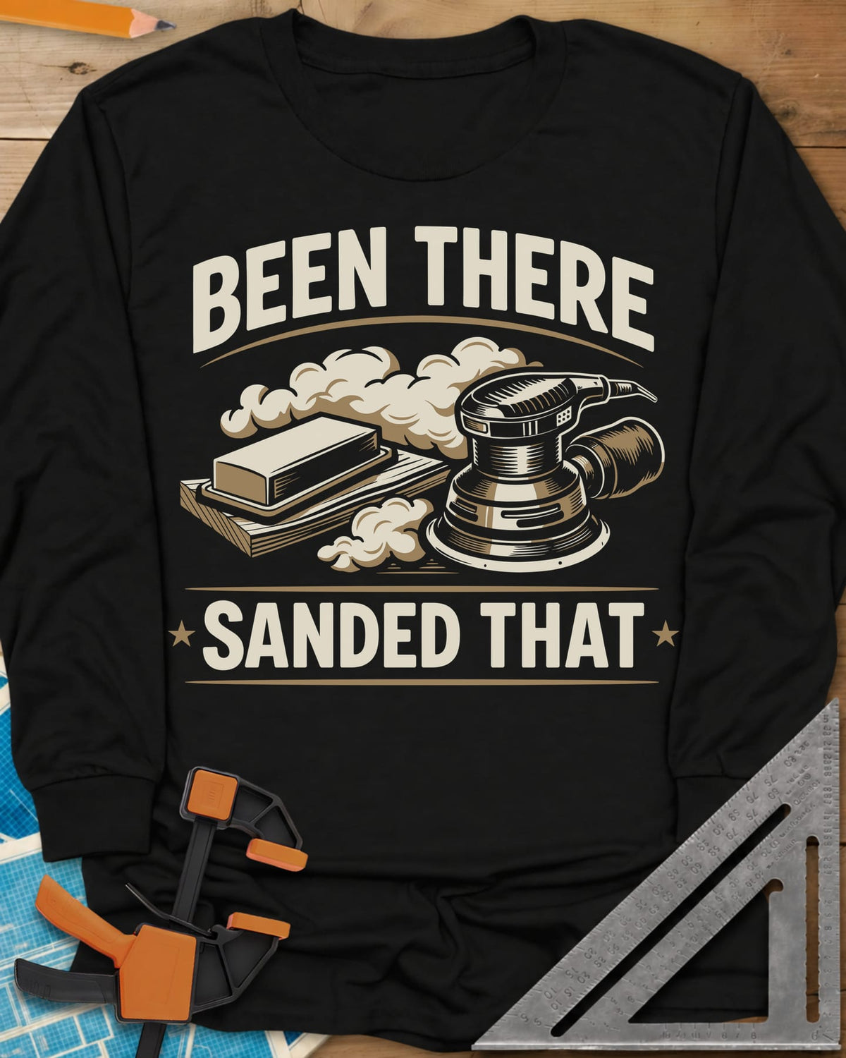 Been There Sanded That long sleeve shirt in Black, a random orbital sander and sanding block in clouds of dust