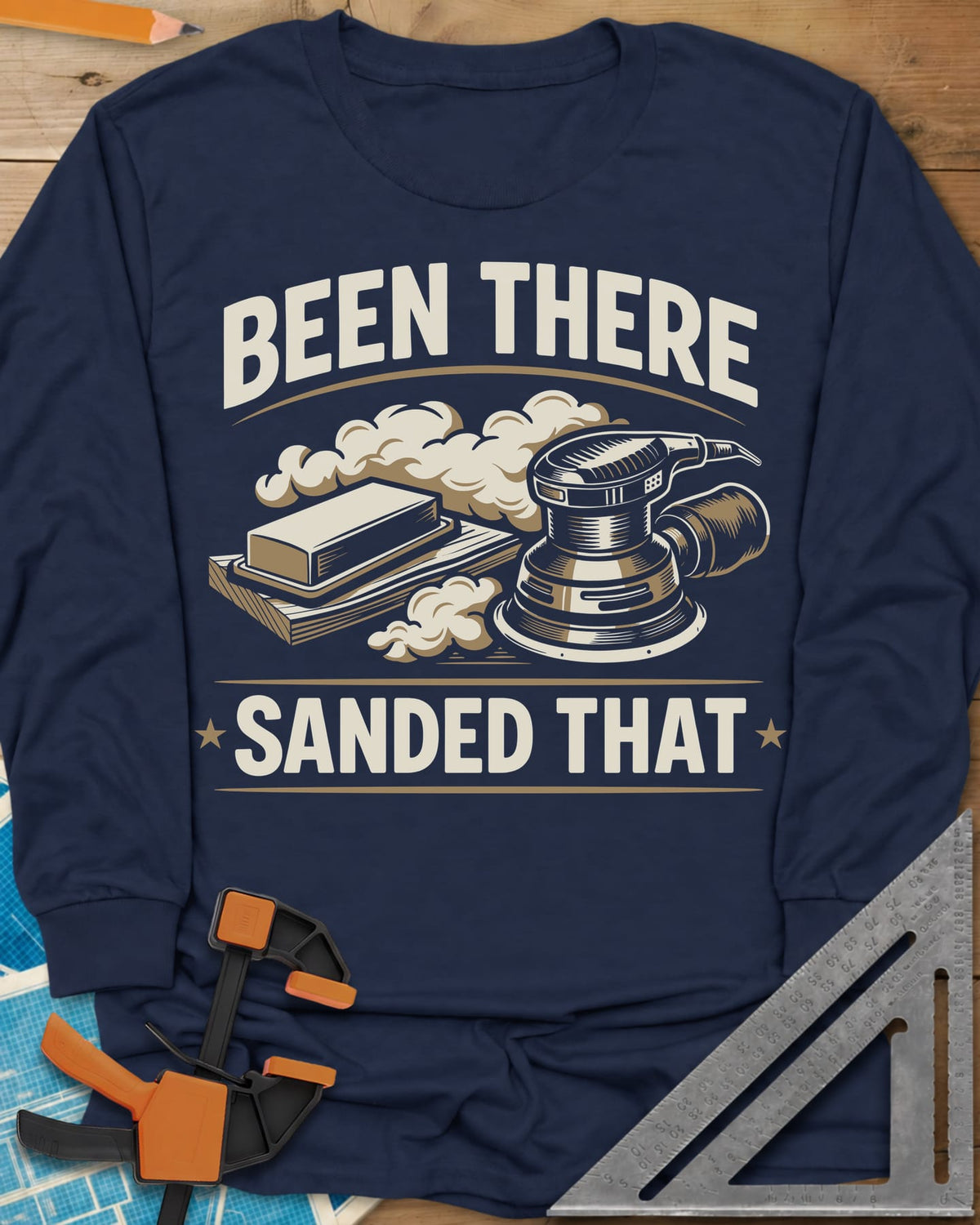 Been There Sanded That long sleeve shirt in Navy, a random orbital sander and sanding block in clouds of dust
