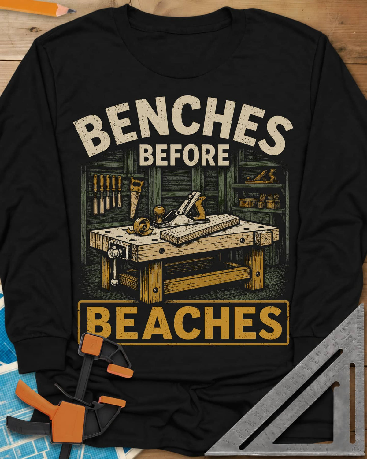 Benches Before Beaches long sleeve shirt in Black, a woodworking bench with a hand plane, chisels and a saw on the wall