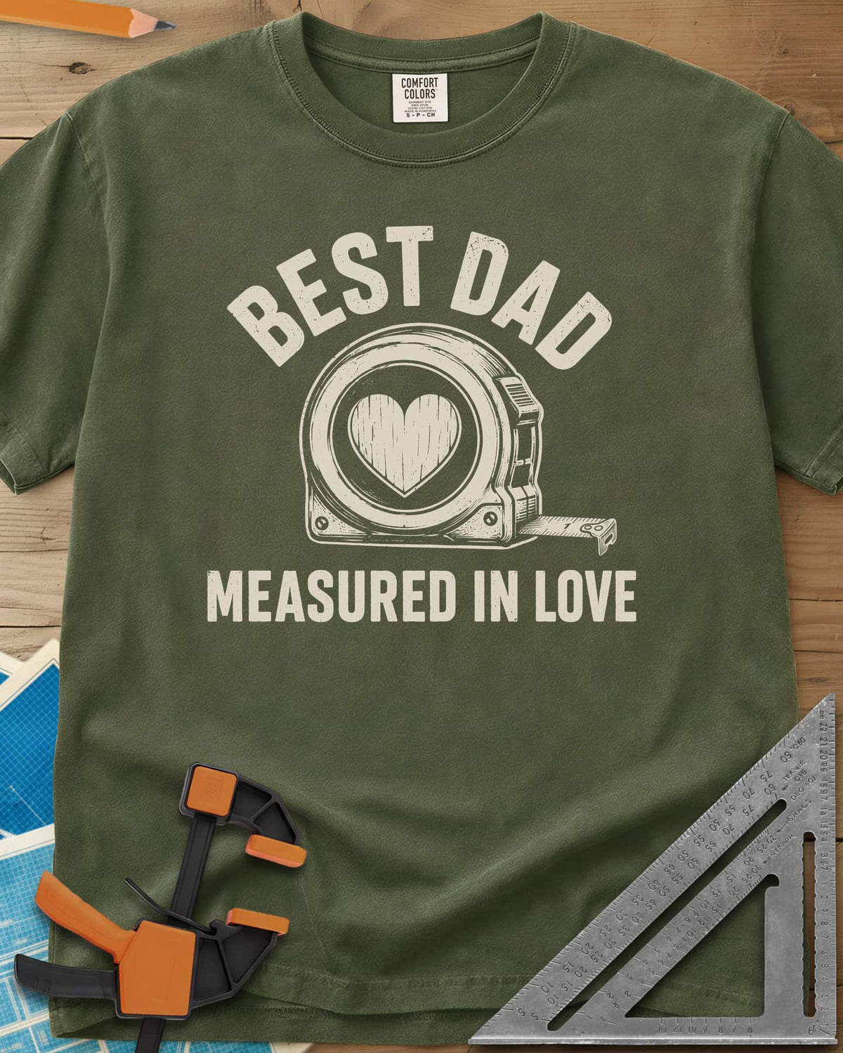 Best Dad Measured In Love heavyweight tee in Hemp, a round tape measure with a wood-grain heart on its face