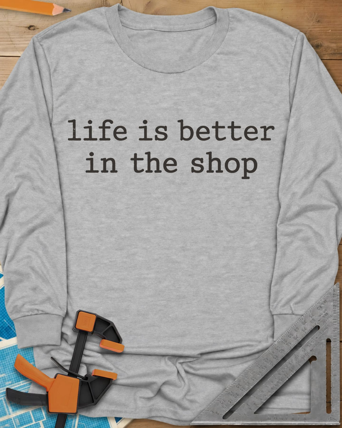 Better In The Shop long sleeve shirt in Sport Grey, plain typewriter-style lowercase text on two lines, no graphic