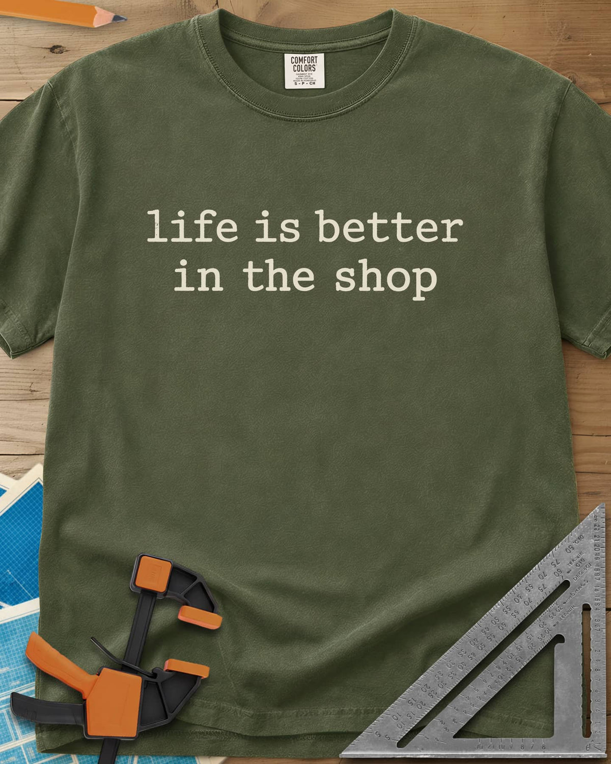 Better In The Shop heavyweight tee in Hemp, plain typewriter-style lowercase text on two lines, no graphic