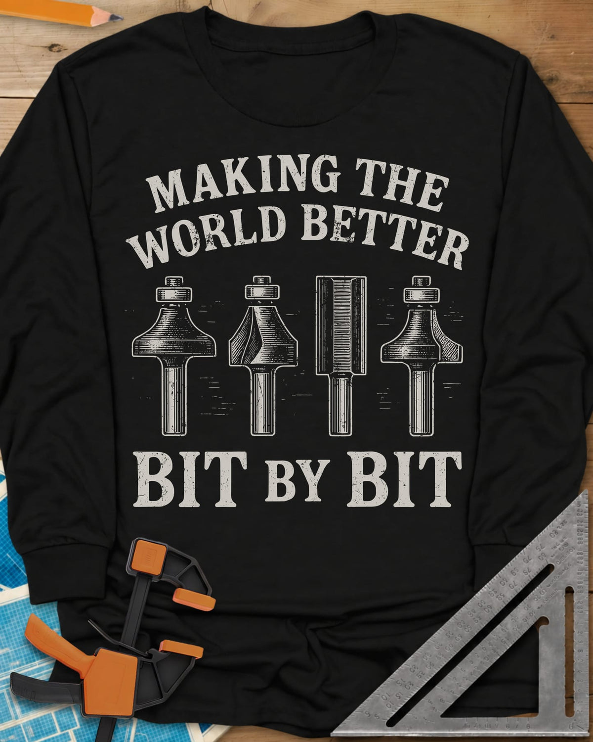 Bit by Bit long sleeve shirt in Black, four engraved-style router bits between two lines of lettering