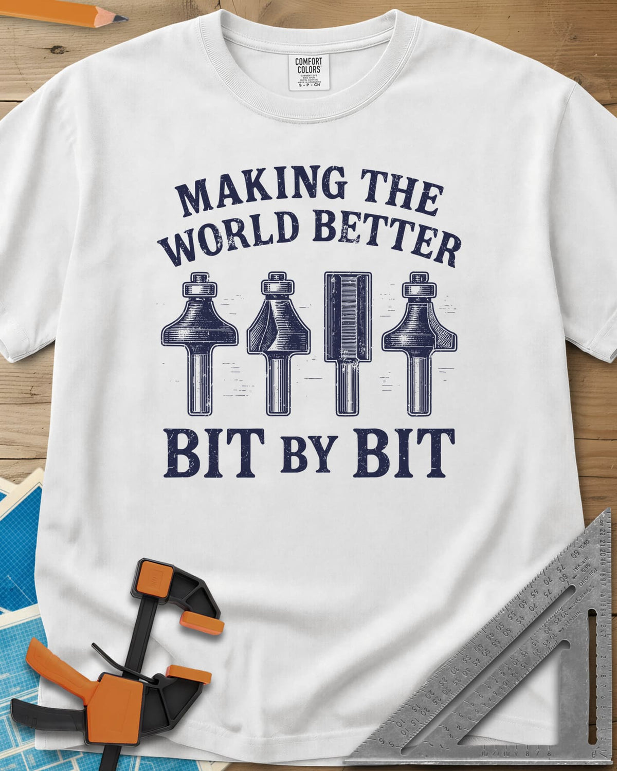 Bit by Bit heavyweight tee in White, four engraved-style router bits between two lines of lettering