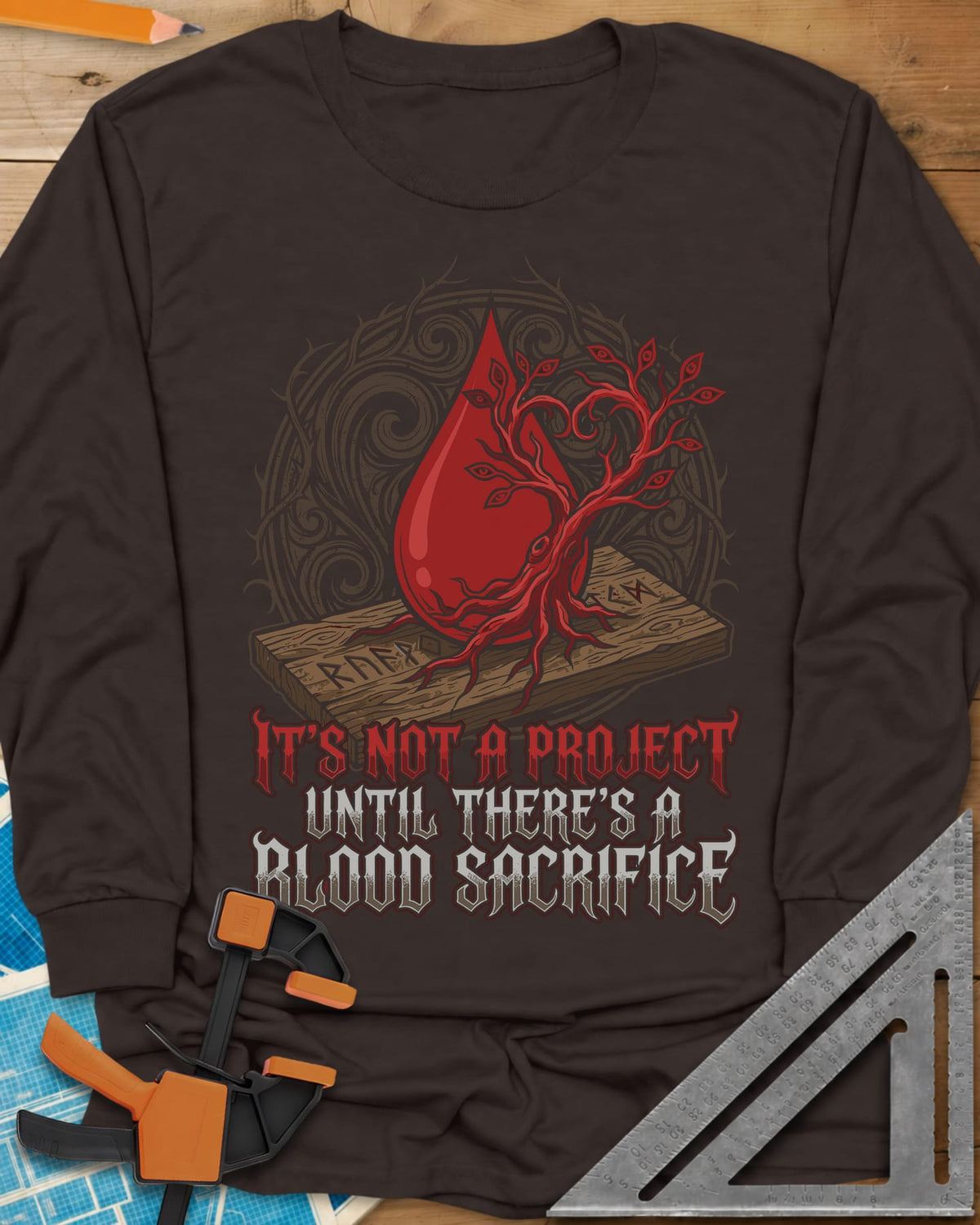 Blood Sacrifice long sleeve shirt in Dark Chocolate, a blood drop and bare tree on a rune-carved board, gothic lettering