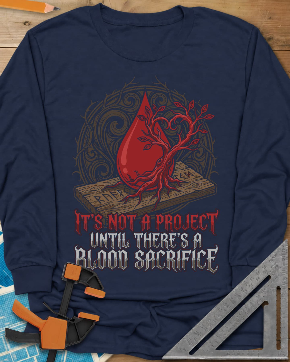 Blood Sacrifice long sleeve shirt in Navy, a blood drop and bare tree on a rune-carved board, gothic lettering