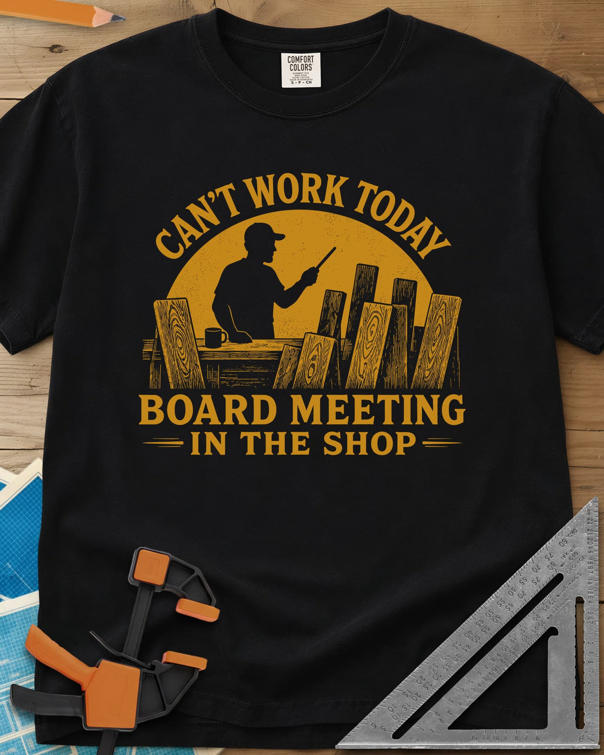 Board Meeting heavyweight tee in Black, a man presenting to a row of upright boards under a big sun