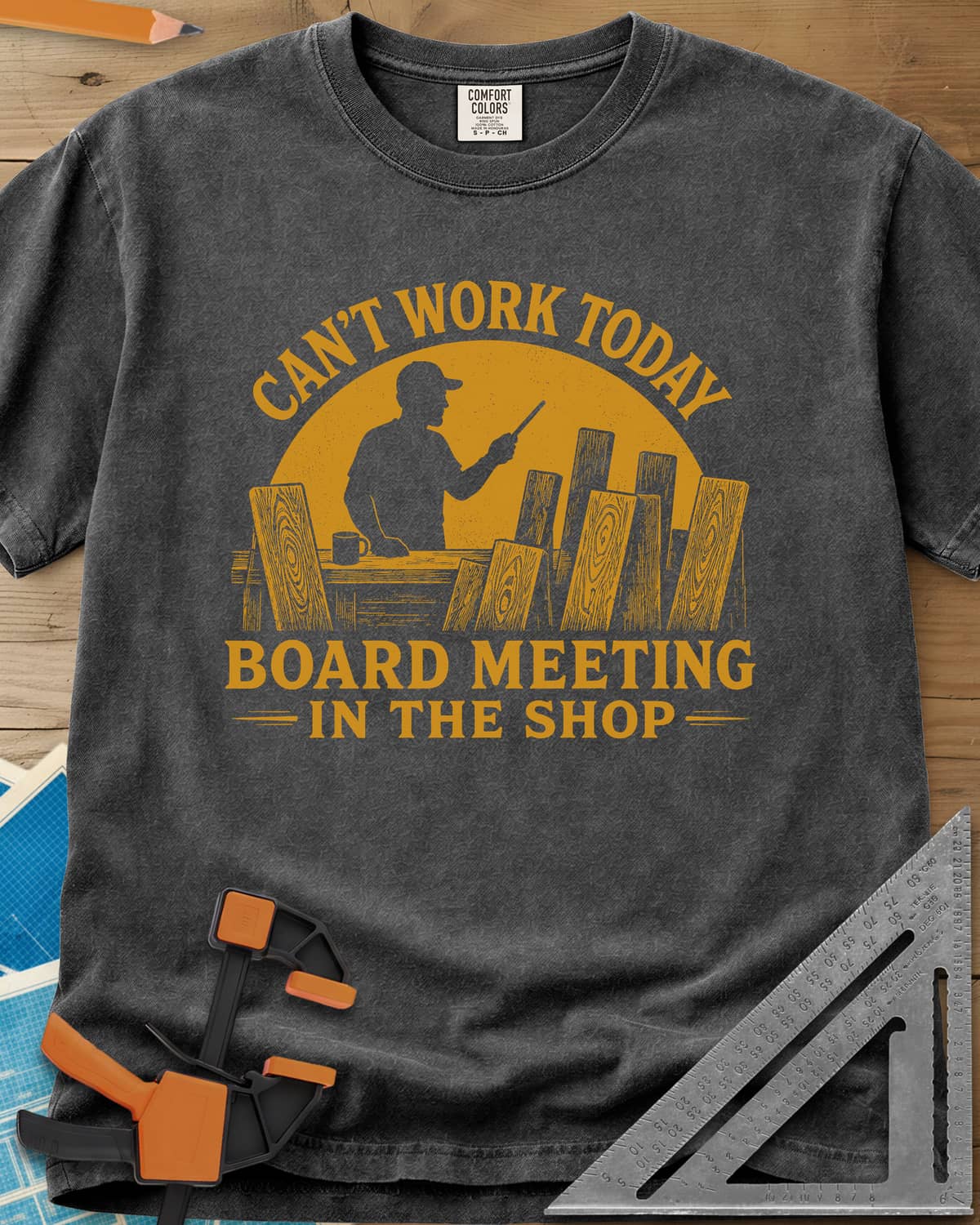 Board Meeting heavyweight tee in Pepper, a man presenting to a row of upright boards under a big sun