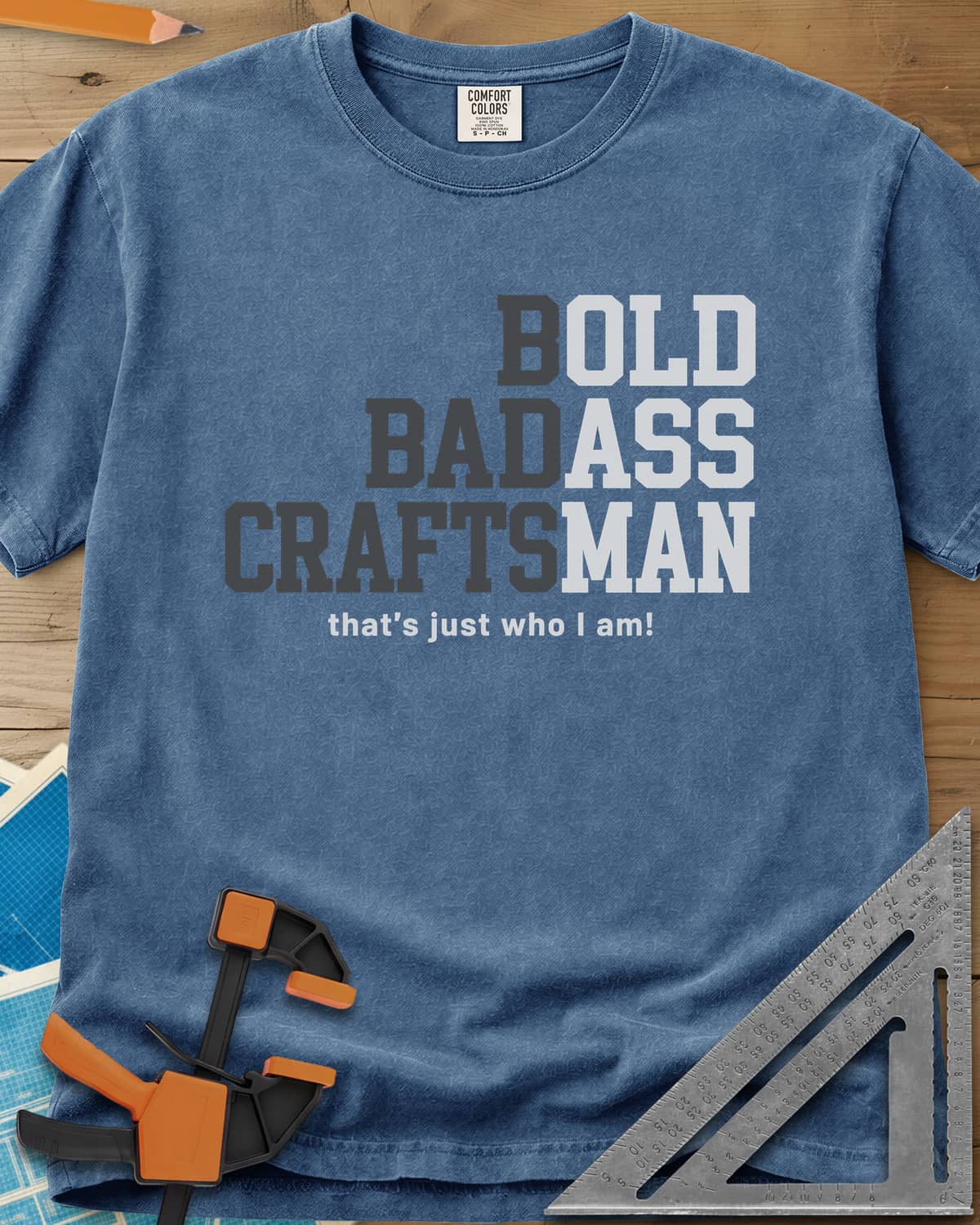 Bold Badass Craftsman heavyweight tee in Blue Jean, stacked block letters split into grey and white halves