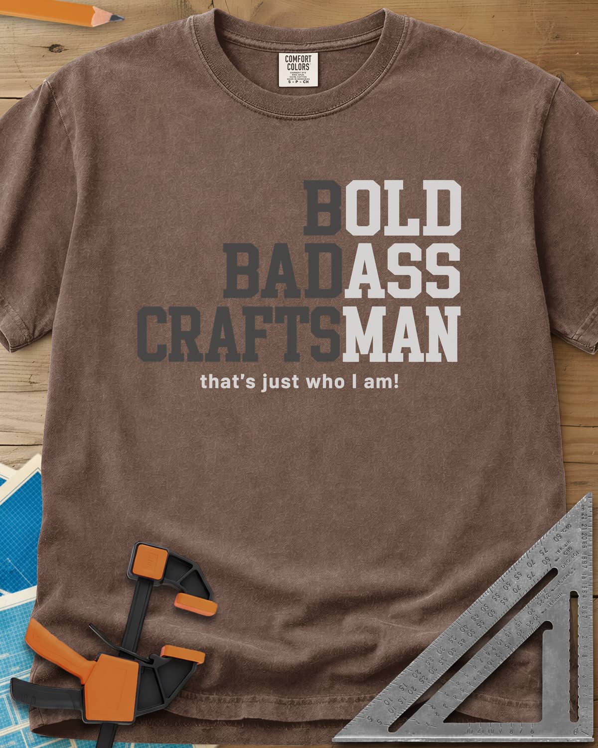 Bold Badass Craftsman heavyweight tee in Espresso, stacked block letters split into grey and white halves