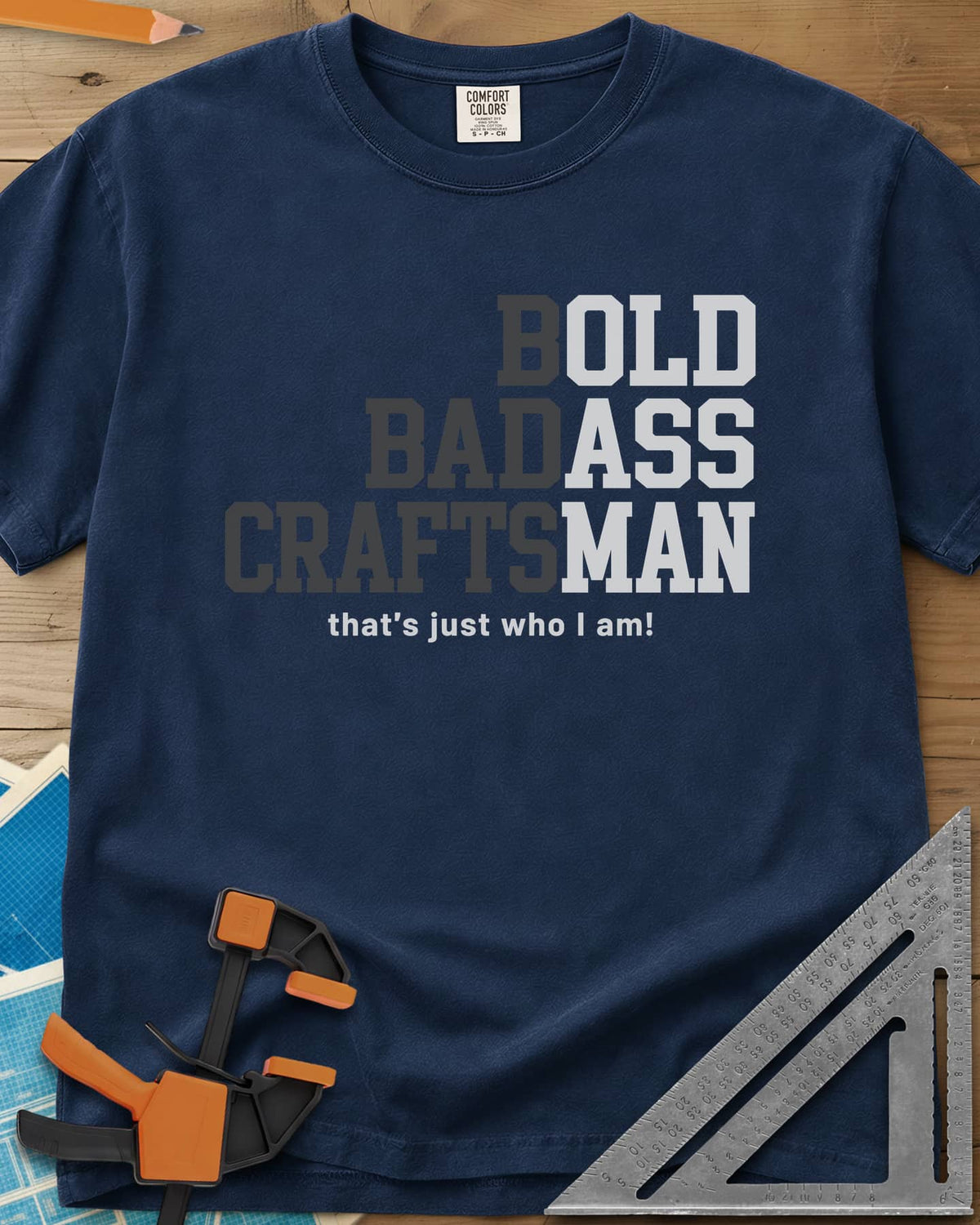 Bold Badass Craftsman heavyweight tee in Navy, stacked block letters split into grey and white halves