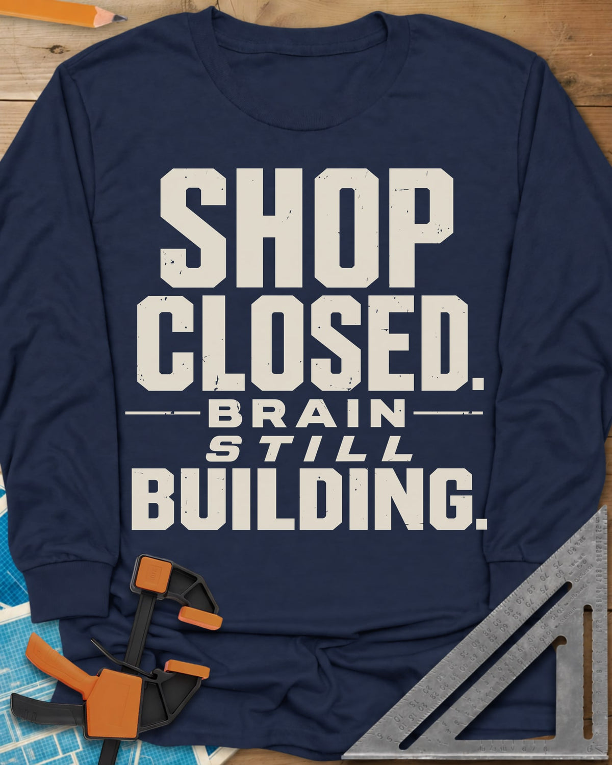 Brain Building long sleeve shirt in Navy, stacked block lettering with STILL in italics, no graphic