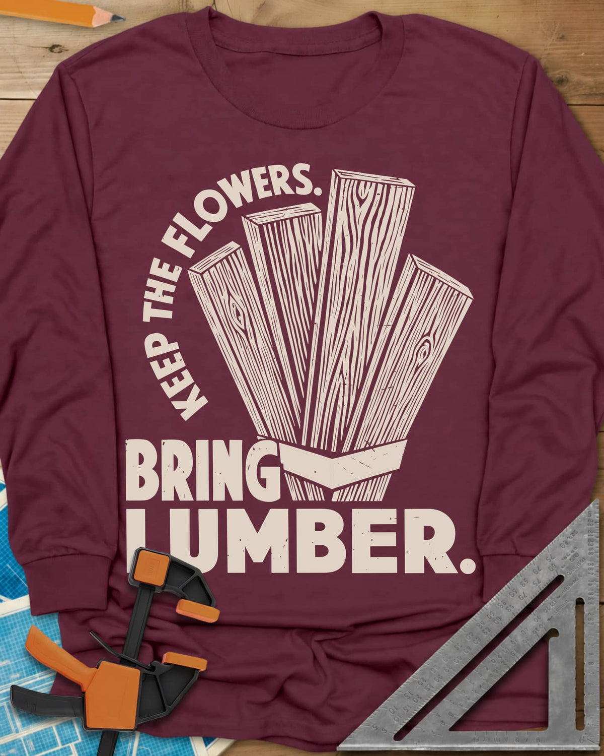 Bring Lumber long sleeve shirt in Maroon, four wood-grain boards fanned out like a bouquet