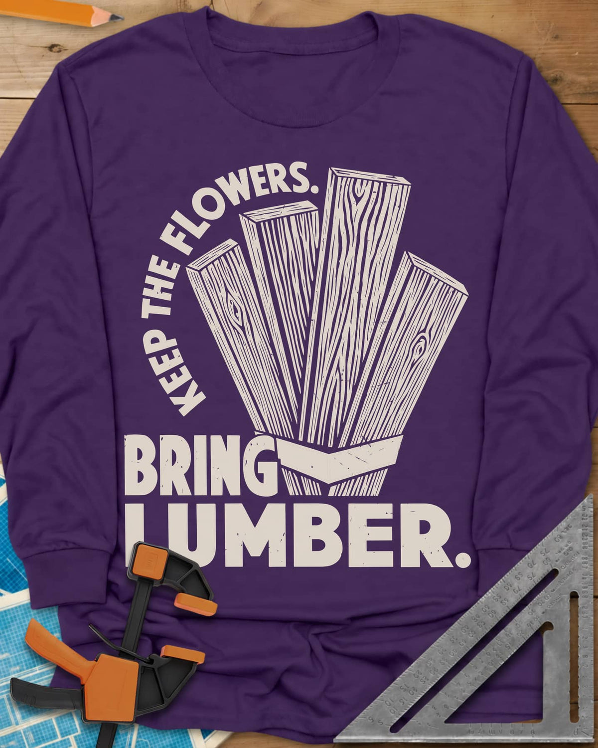 Bring Lumber long sleeve shirt in Purple, four wood-grain boards fanned out like a bouquet