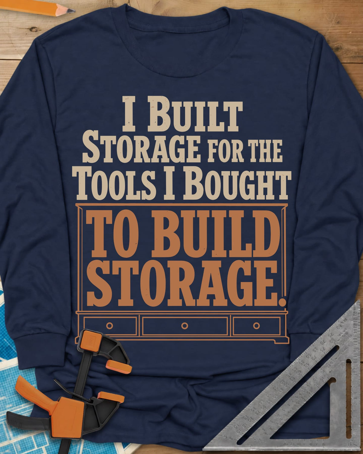 Build Storage long sleeve shirt in Navy, lettering framed by a three-drawer sideboard outline