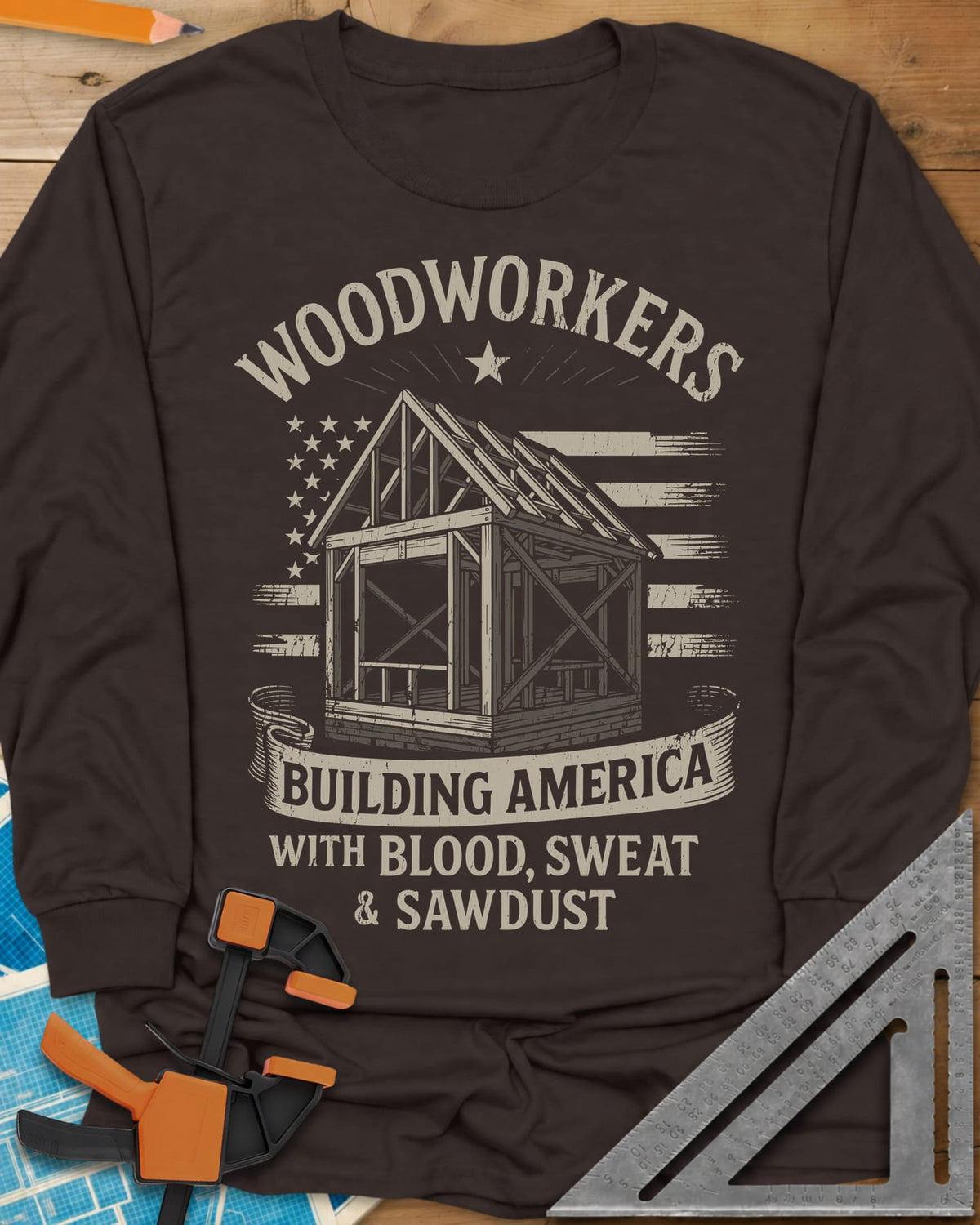 Building America long sleeve shirt in Dark Chocolate, a timber frame in front of a worn American flag