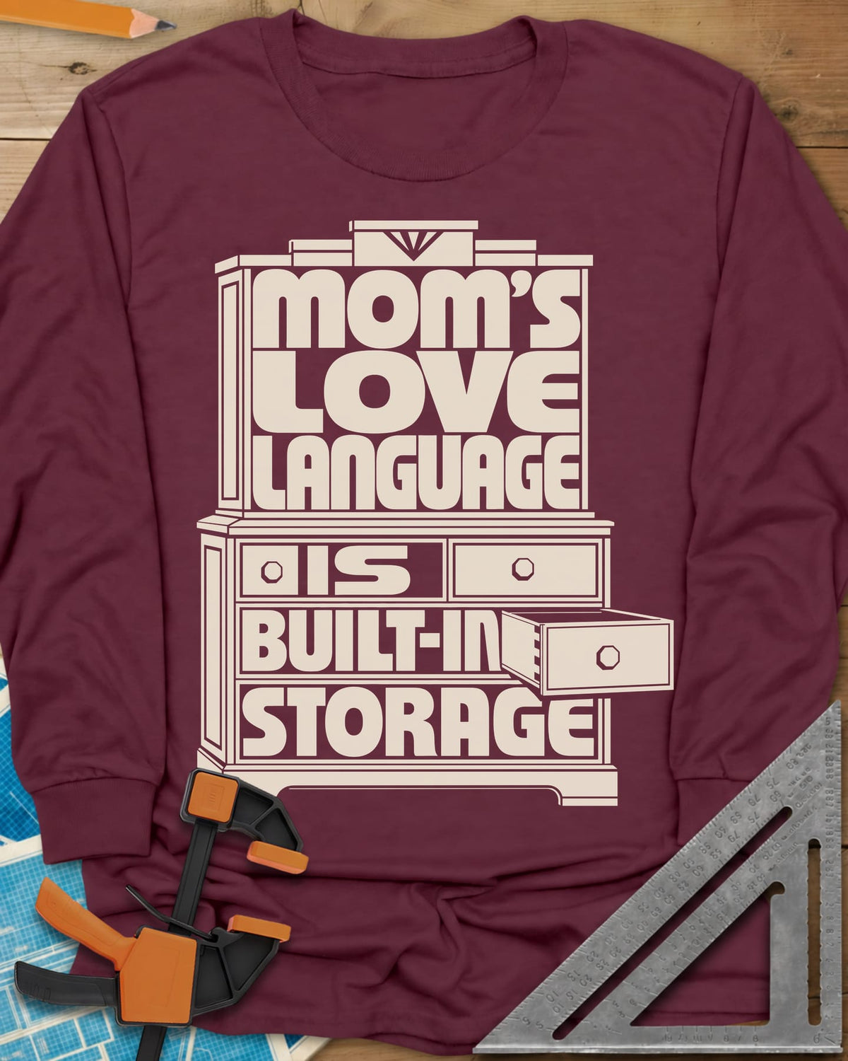 Built-In Storage long sleeve shirt in Maroon, block letters set inside a hutch outline with one drawer open