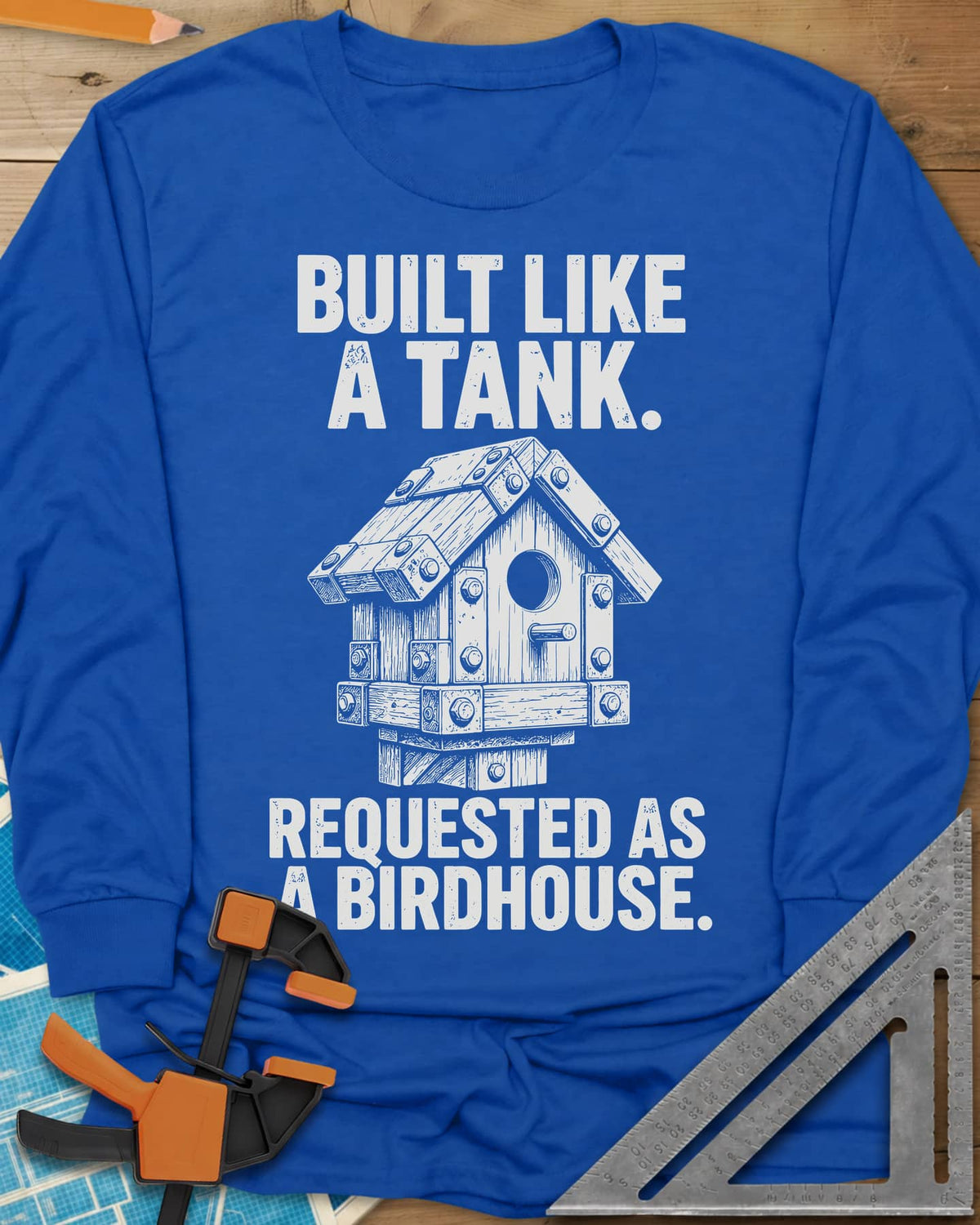 Built Like A Tank long sleeve shirt in Royal, a birdhouse armored with bolted plates and brackets