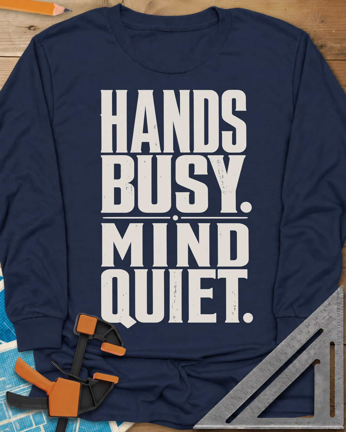 Busy Hands long sleeve shirt in Navy, tall stacked block capitals with a dotted divider, no graphic