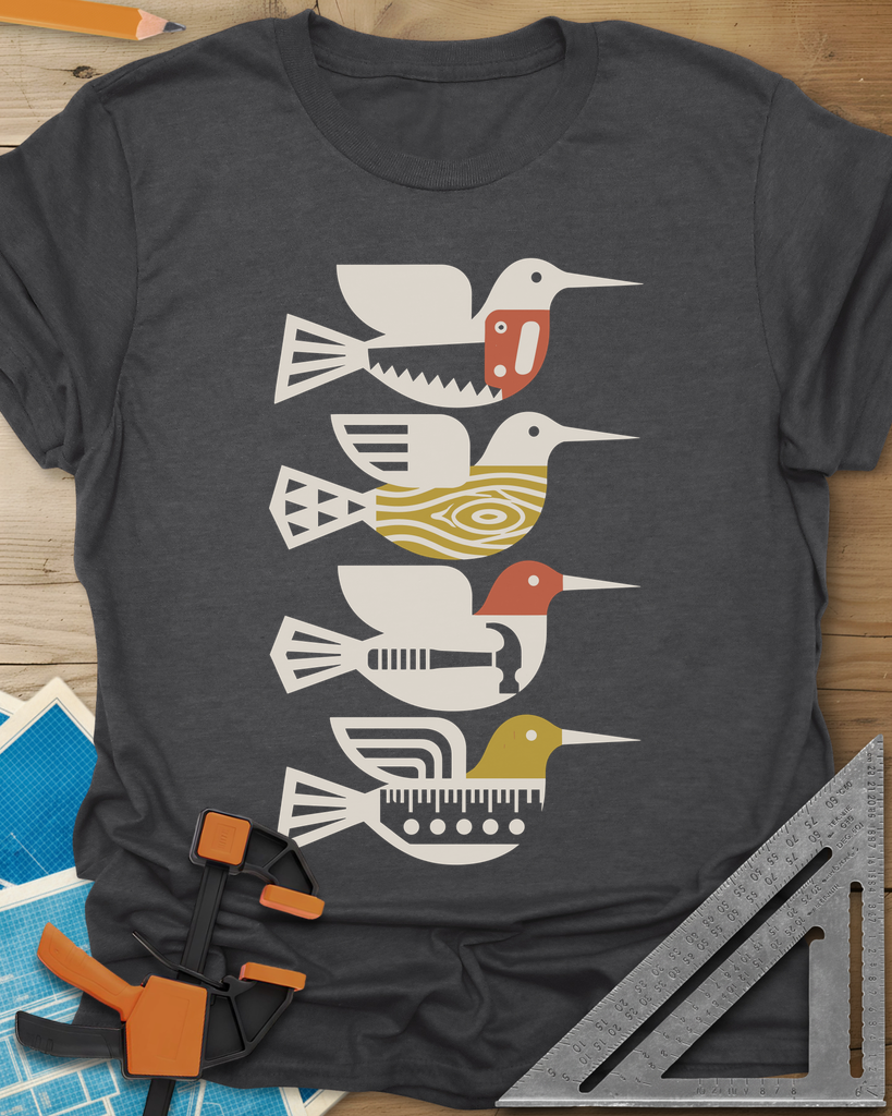 Woodworking Birds t-shirt in Dark Heather Grey, four stacked birds built from a saw, wood grain, hammer and ruler